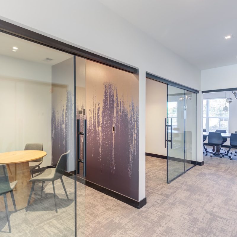 Station 250 collaborative workspace with modern table, chairs, and professional meeting environment Mundelein IL