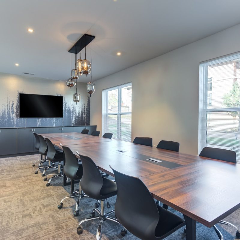 Station 250 conference room with modern table, ergonomic chairs, and professional meeting setup Mundelein IL