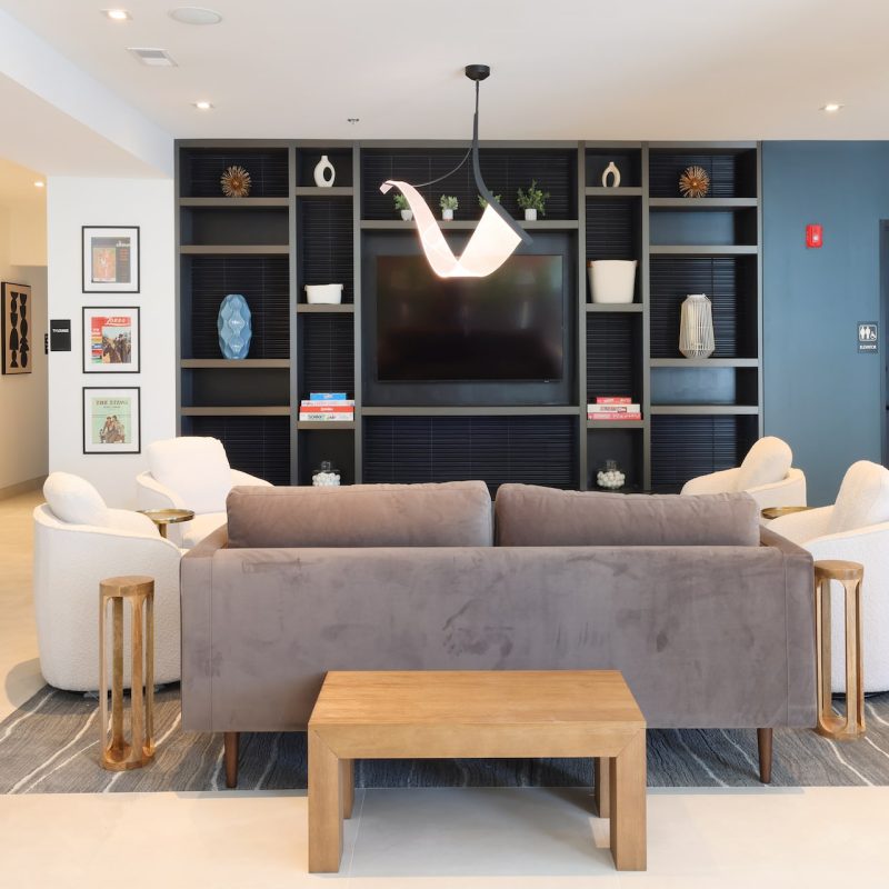 Station 250 intimate seating nook with modern chairs, side tables, and comfortable conversation area Mundelein IL