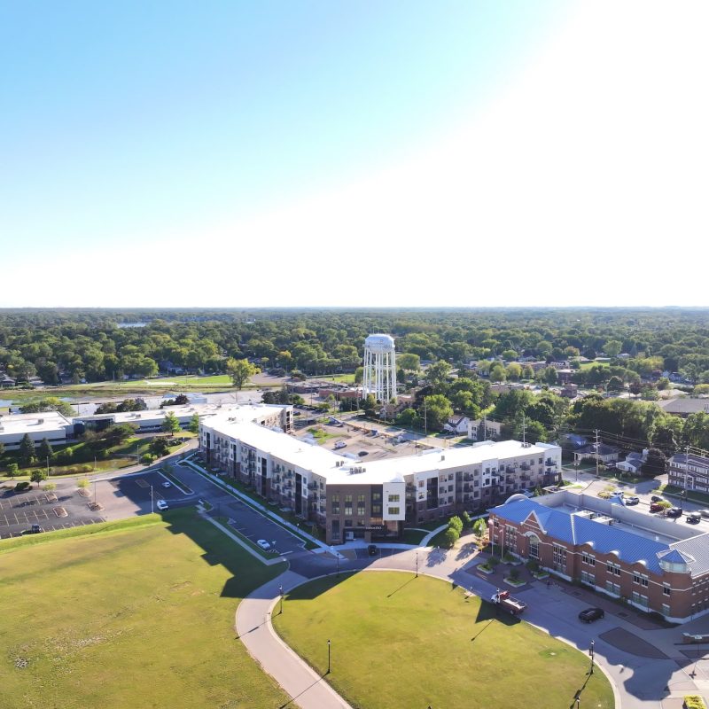 Station 250 apartment complex aerial view showing building layout, parking, and community design in Mundelein IL